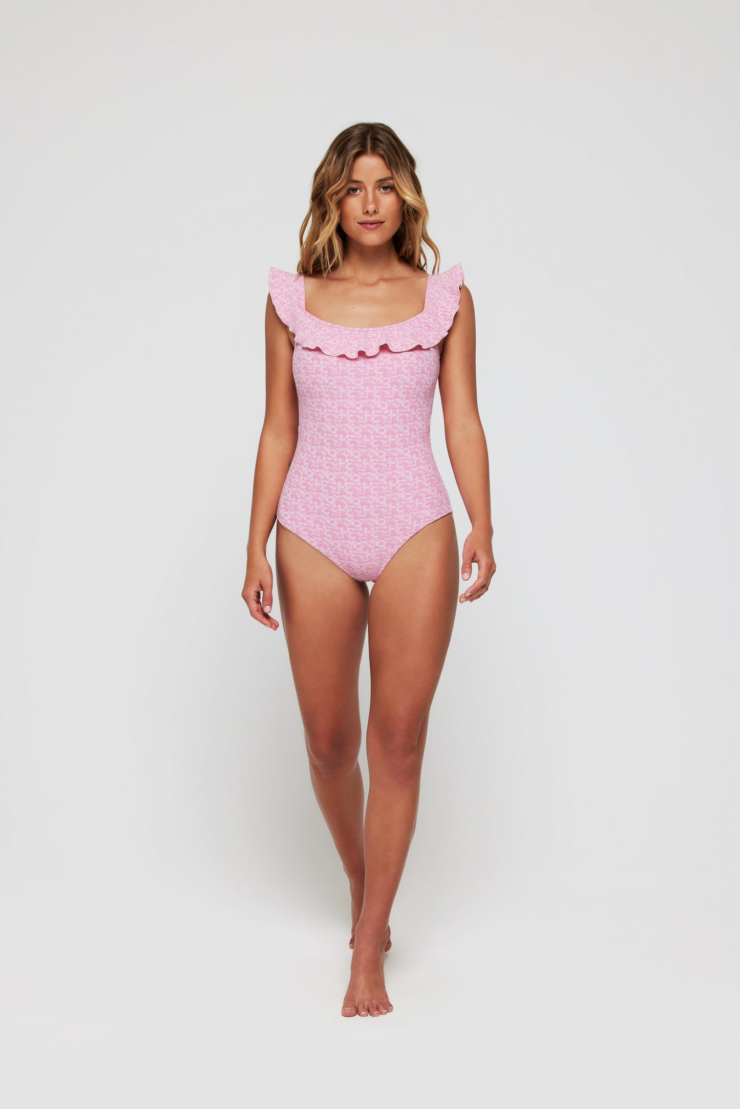 Best seller Toni Off-The-Shoulder Ruffle One-Piece Swimsuit in Coral Weave by Hermoza
