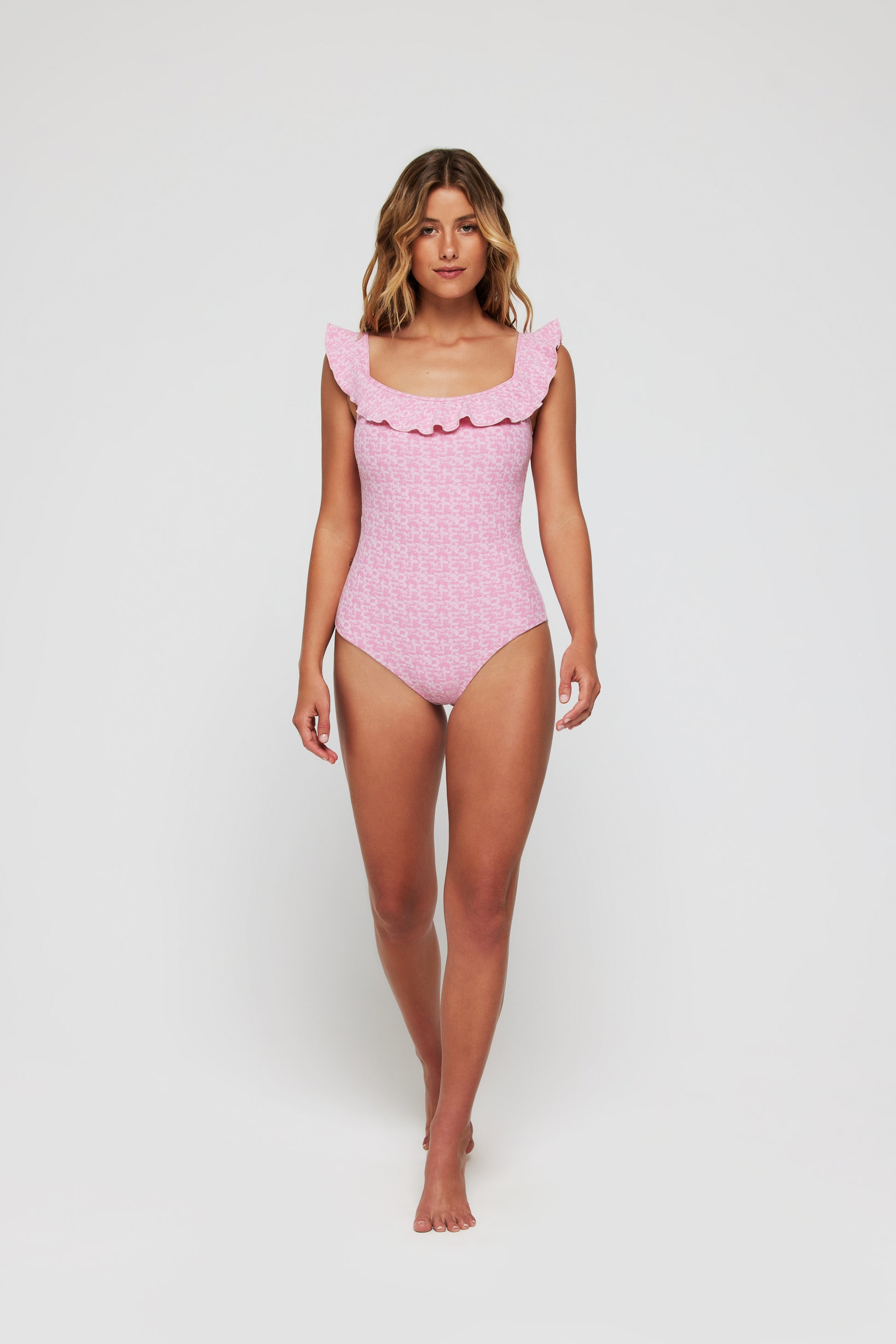Best seller Toni Off-The-Shoulder Ruffle One-Piece Swimsuit in Coral Weave by Hermoza