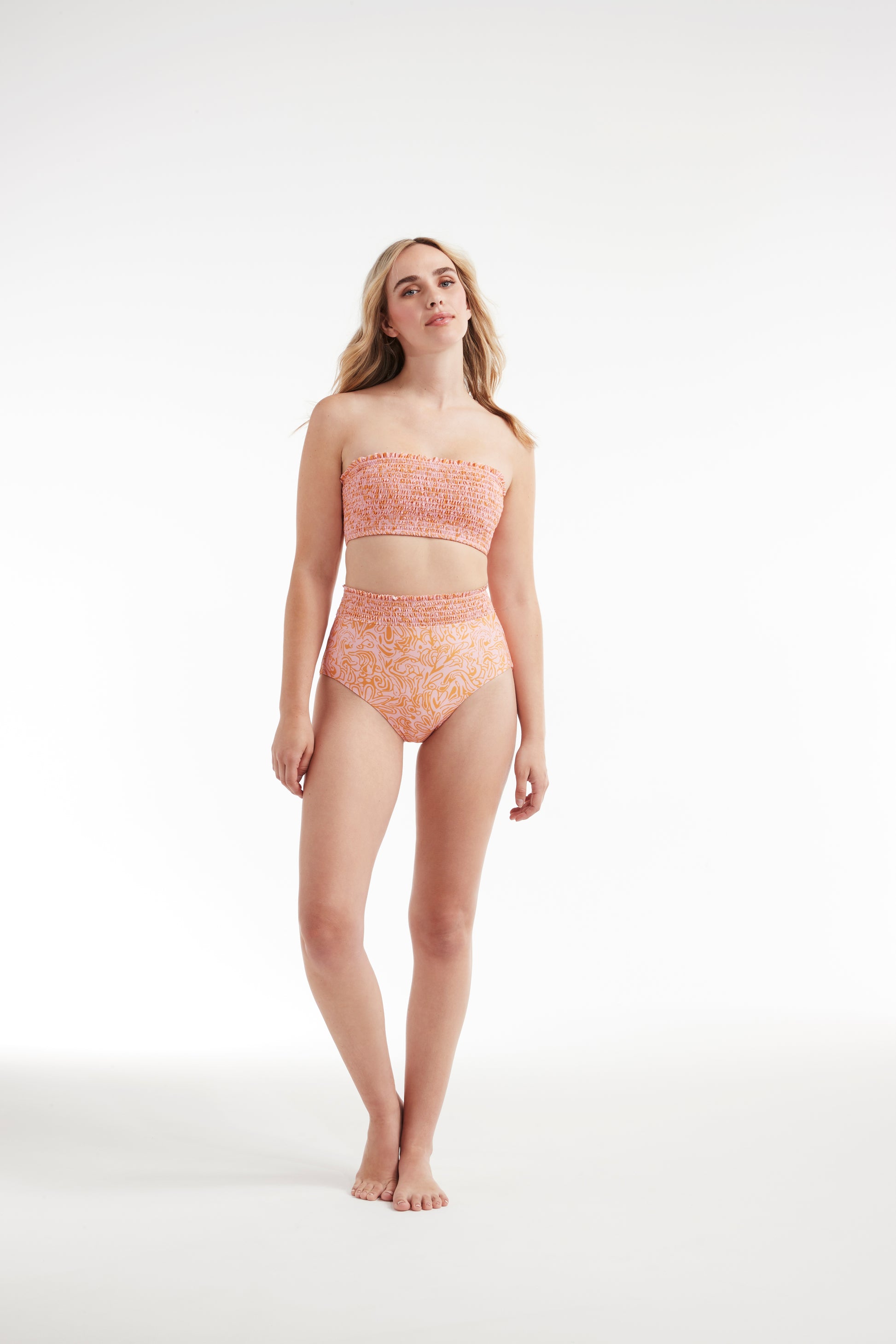 Favorite Hanna Smocked Removable Straps Two-Piece Bikini Top in Peach Medley by Hermoza