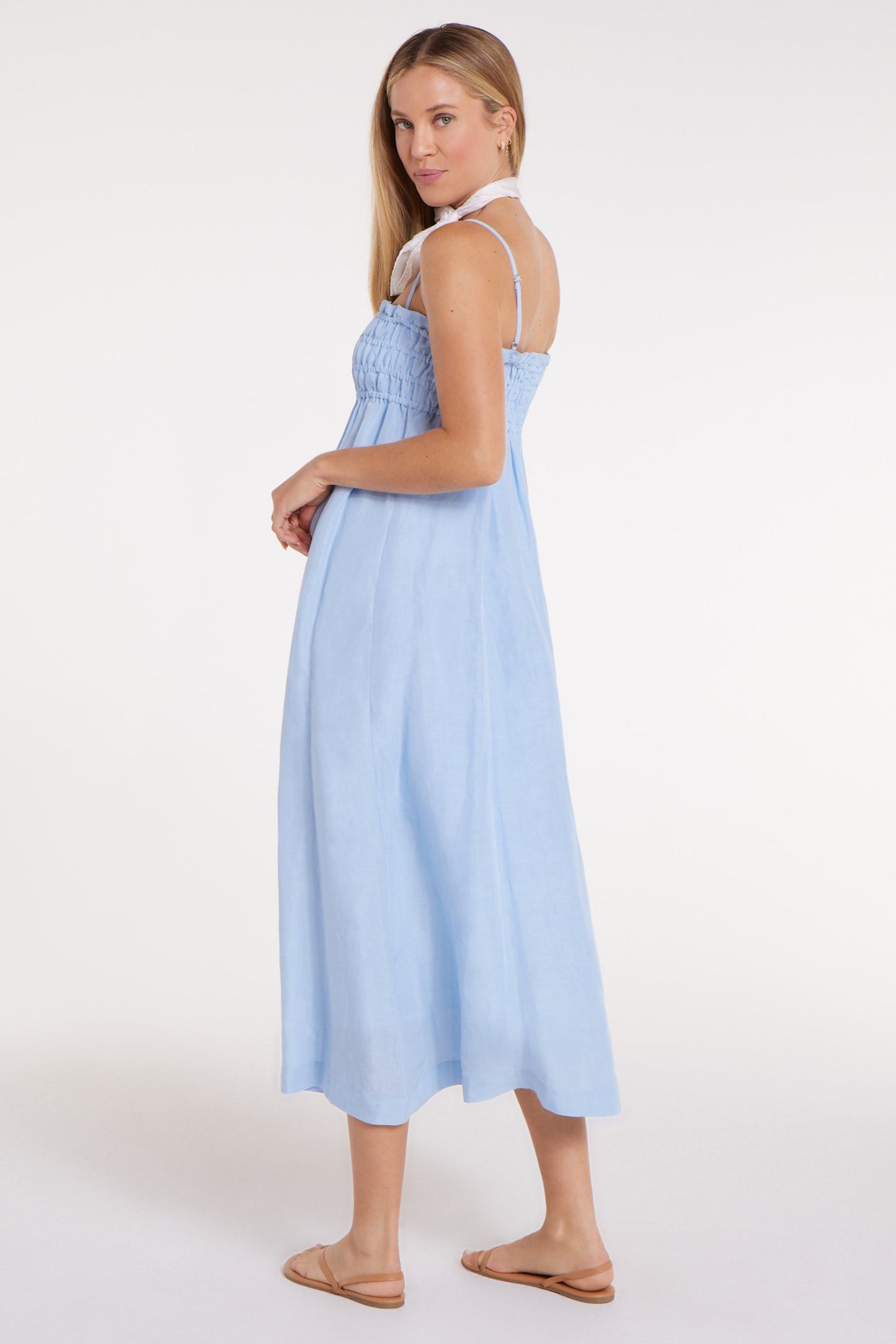 New in Margot Smocked Spaghetti Strap Midi Dress in Chambray Blue by Hermoza
