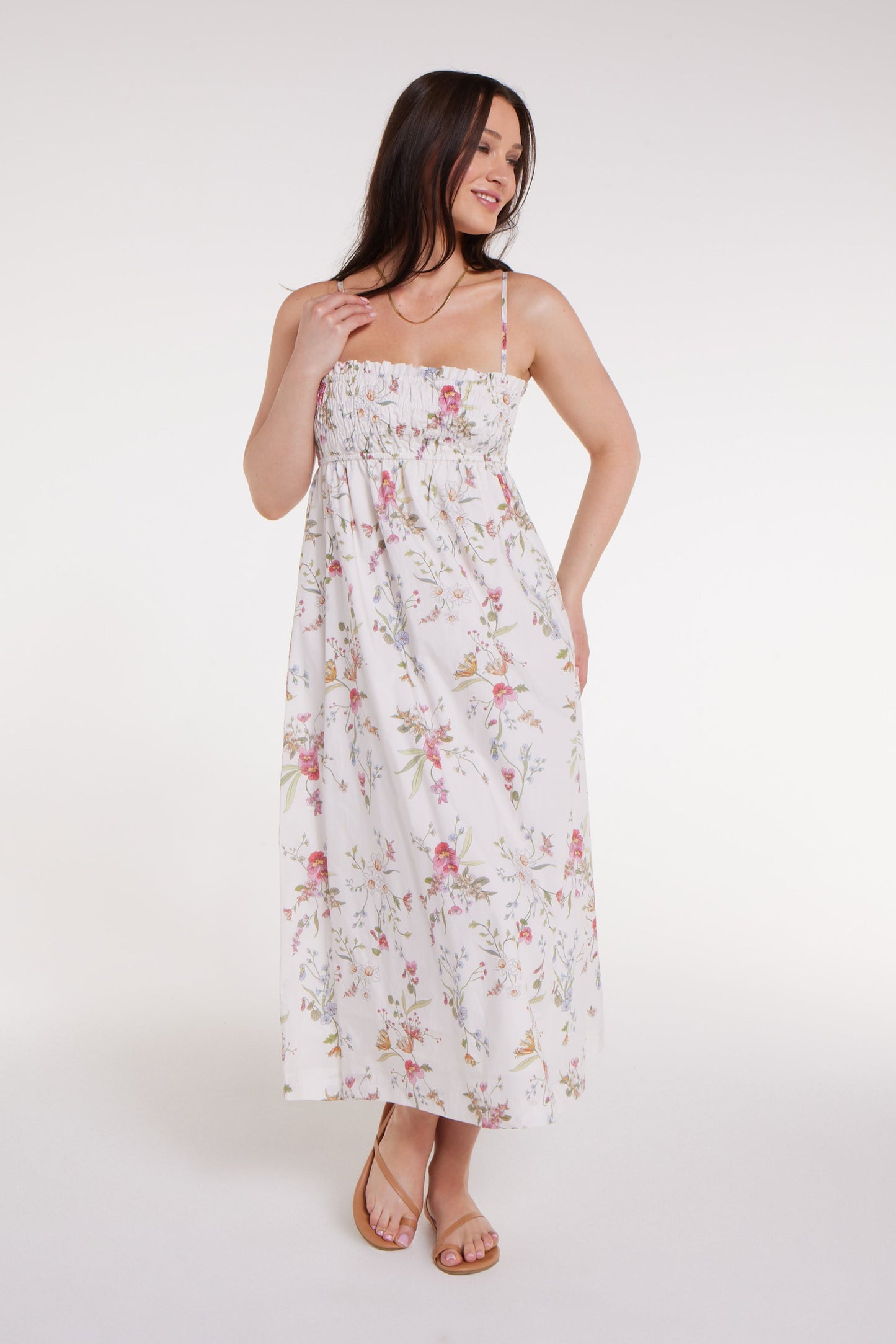 New in Margot Smocked Spaghetti Strap Midi Dress in White Floral by Hermoza