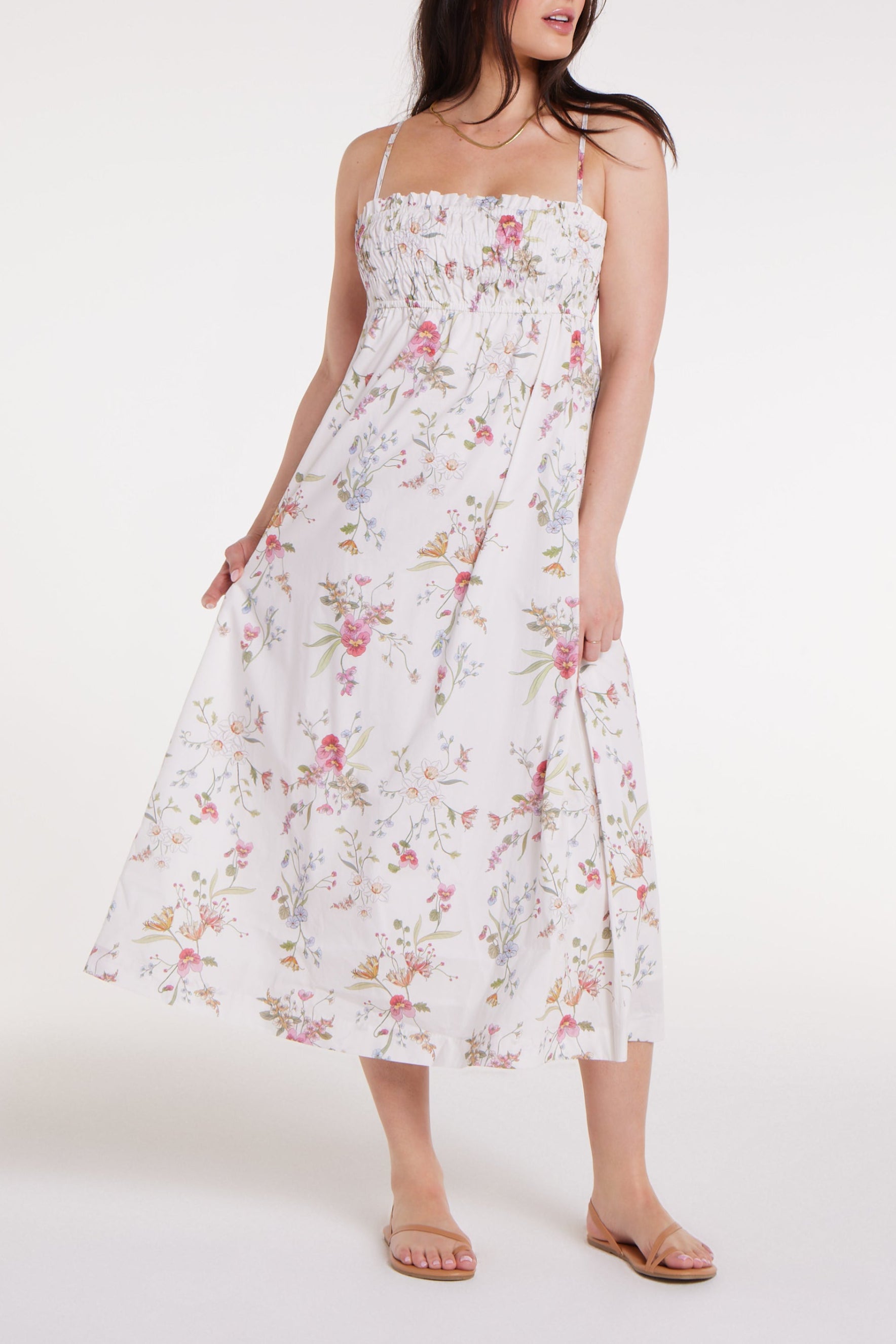 New in Margot Smocked Spaghetti Strap Midi Dress in White Floral by Hermoza