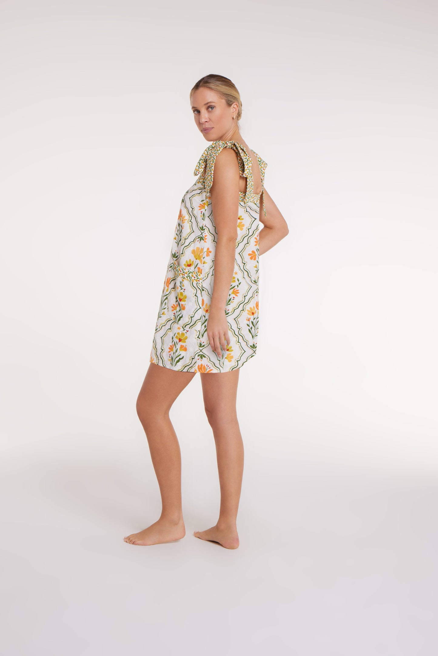 New Product Hillary Bow Tie Mini Dress in Tile Floral by Hermoza