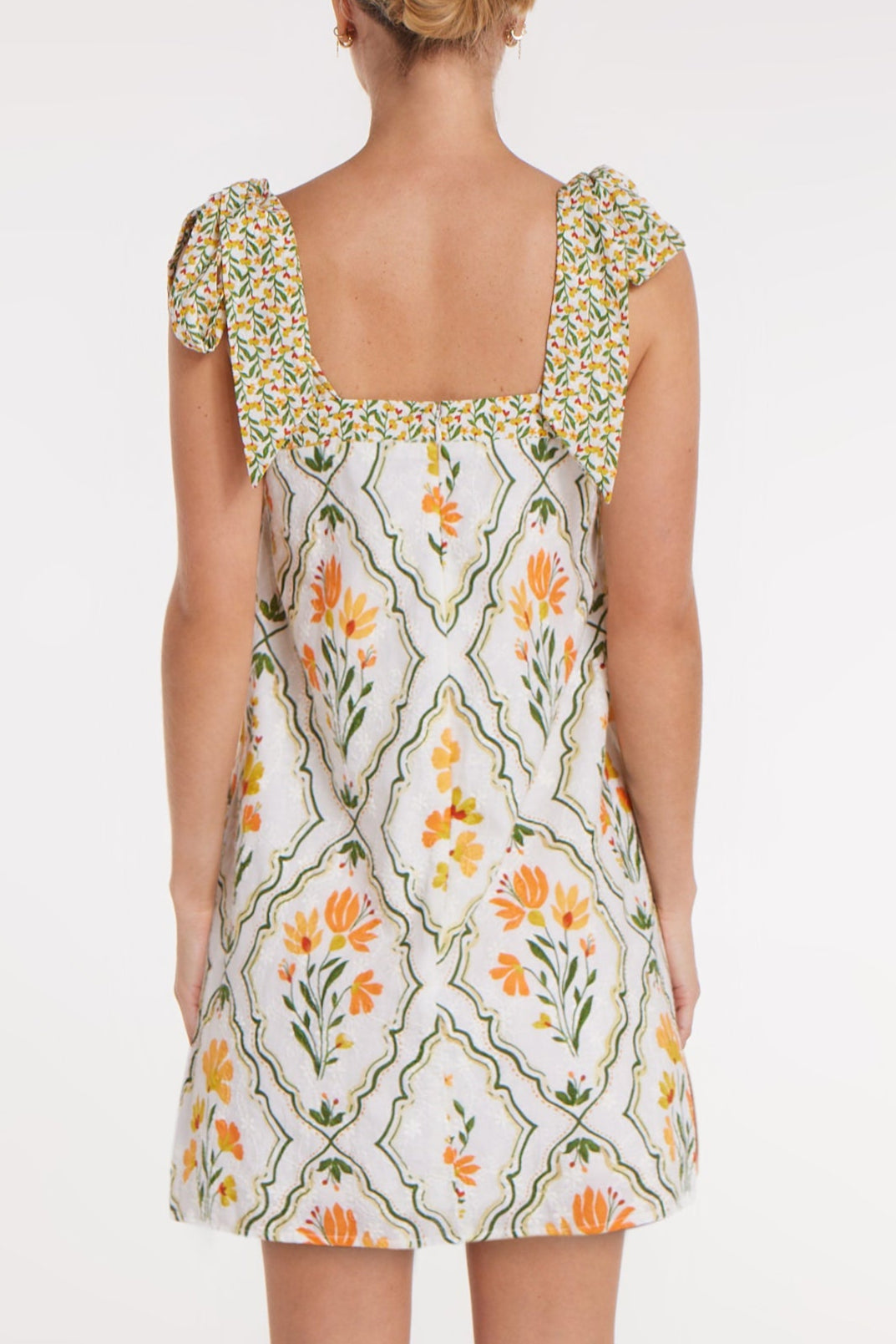New Product Hillary Bow Tie Mini Dress in Tile Floral by Hermoza