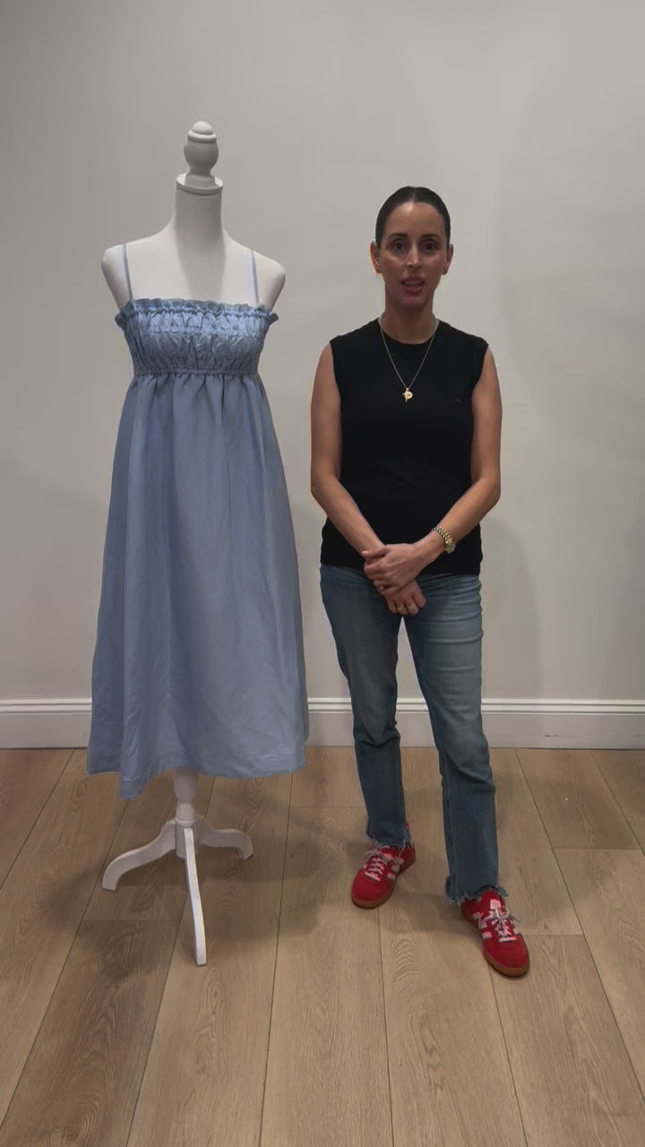 New in Margot Smocked Spaghetti Strap Midi Dress in Chambray Blue by Hermoza
