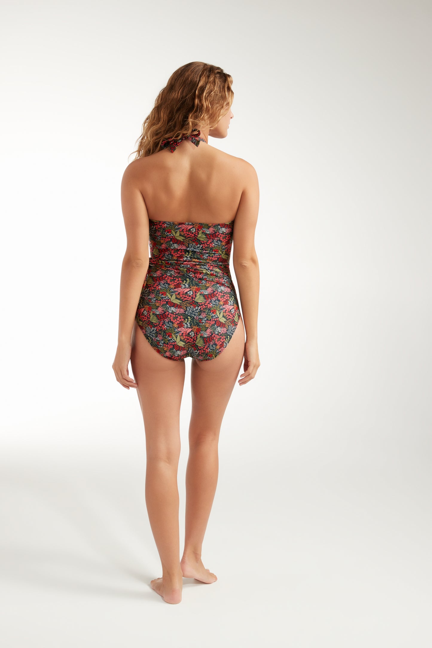Back of Woman Modeling One Piece Swimsuit